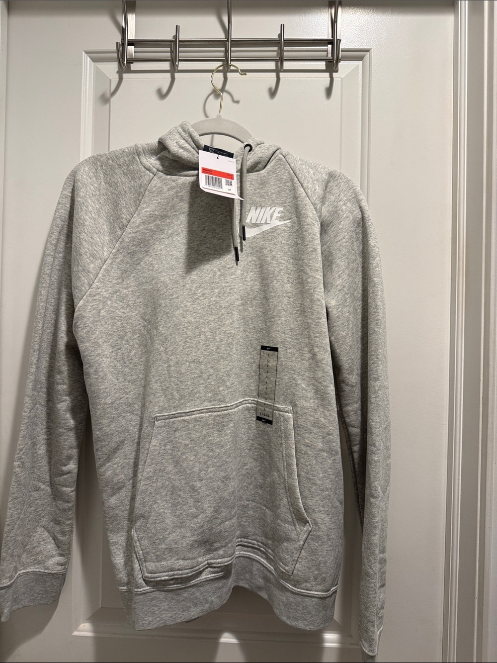 NWT Nike Light Gray Hoodie with White Swoosh. Size Large